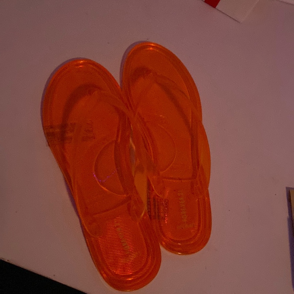 Bright orange sandals